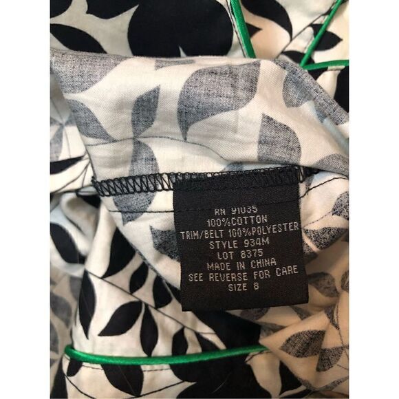 Marianne black and white floral button front with green satin buttoned and trim - Picture 16 of 16